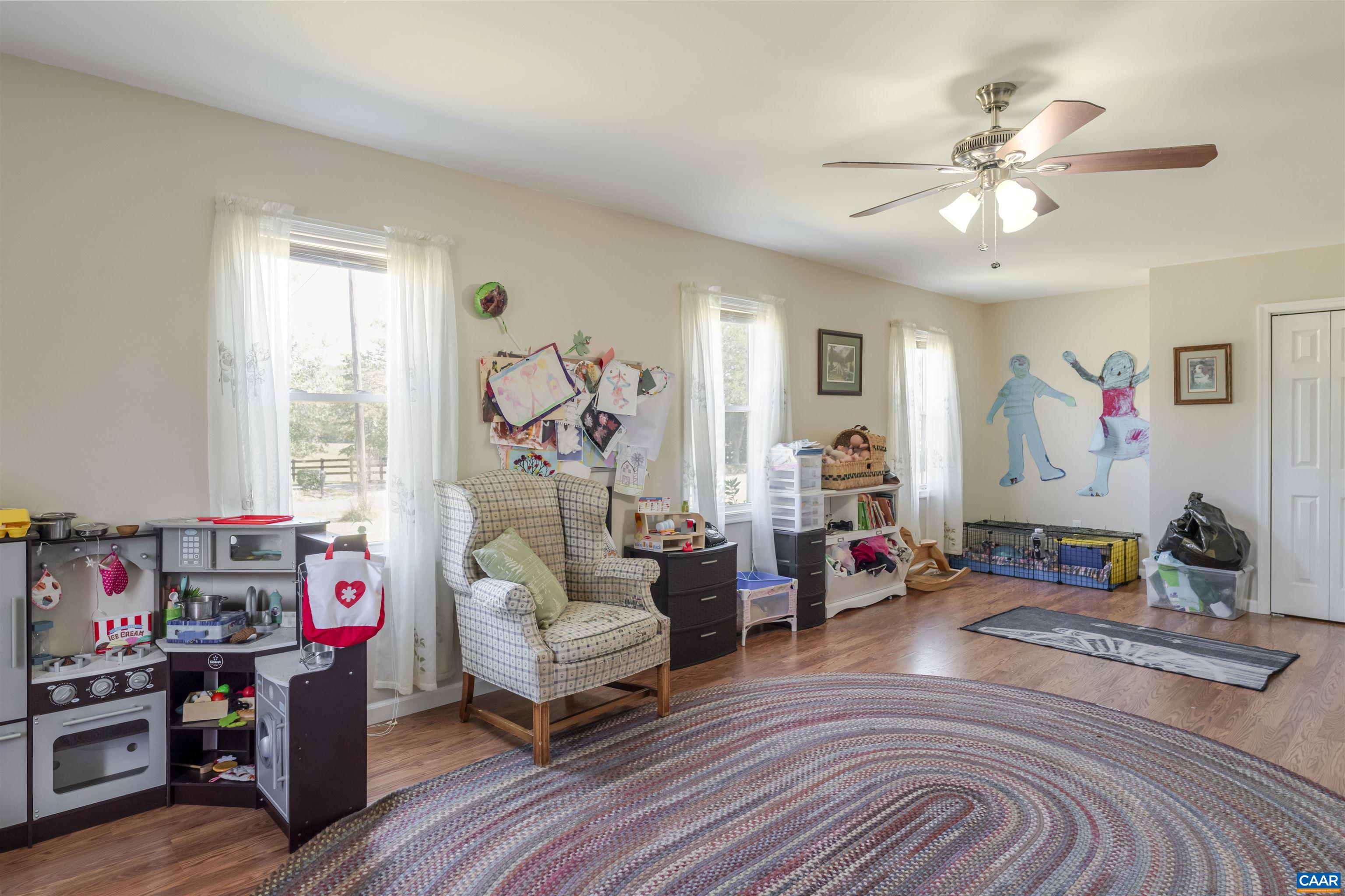 691 Old Roseland Road Roseland, VA 22967 - Photo 23 of 47 a living room with furniture and wooden floor