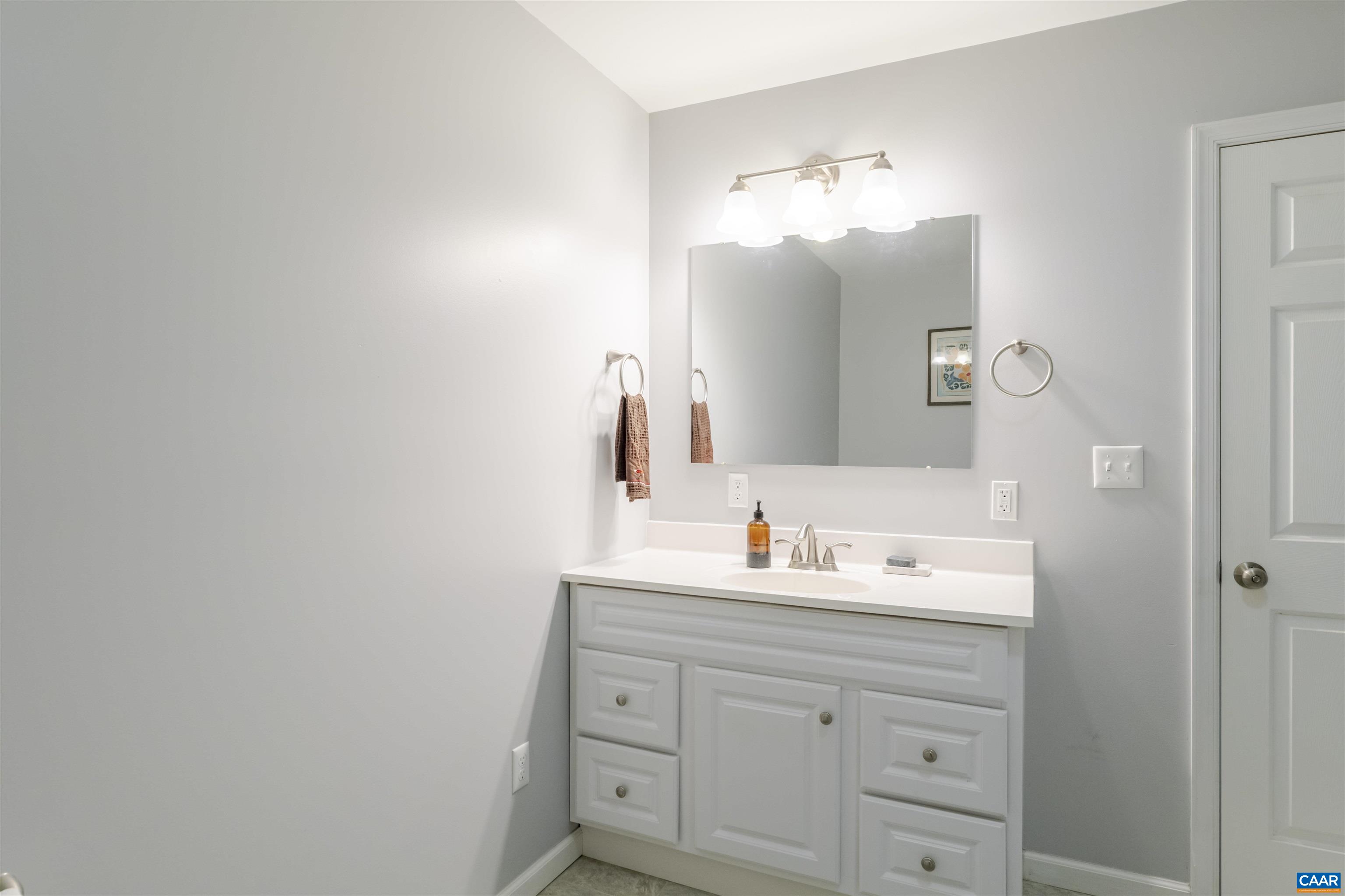 691 Old Roseland Road Roseland, VA 22967 - Photo 26 of 47 a bathroom with a sink and a mirror