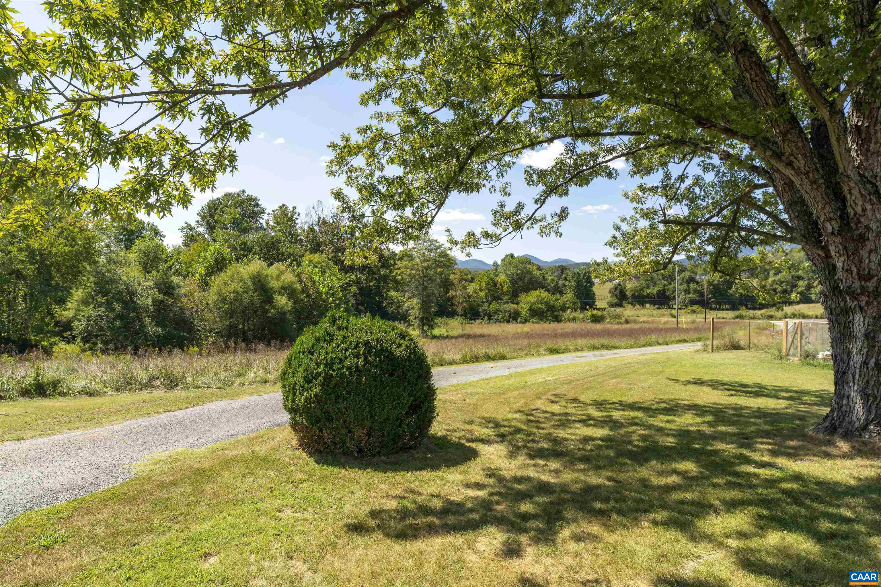 691 Old Roseland Road Roseland, VA 22967 - Photo 3 of 47 a view of a lake with a yard