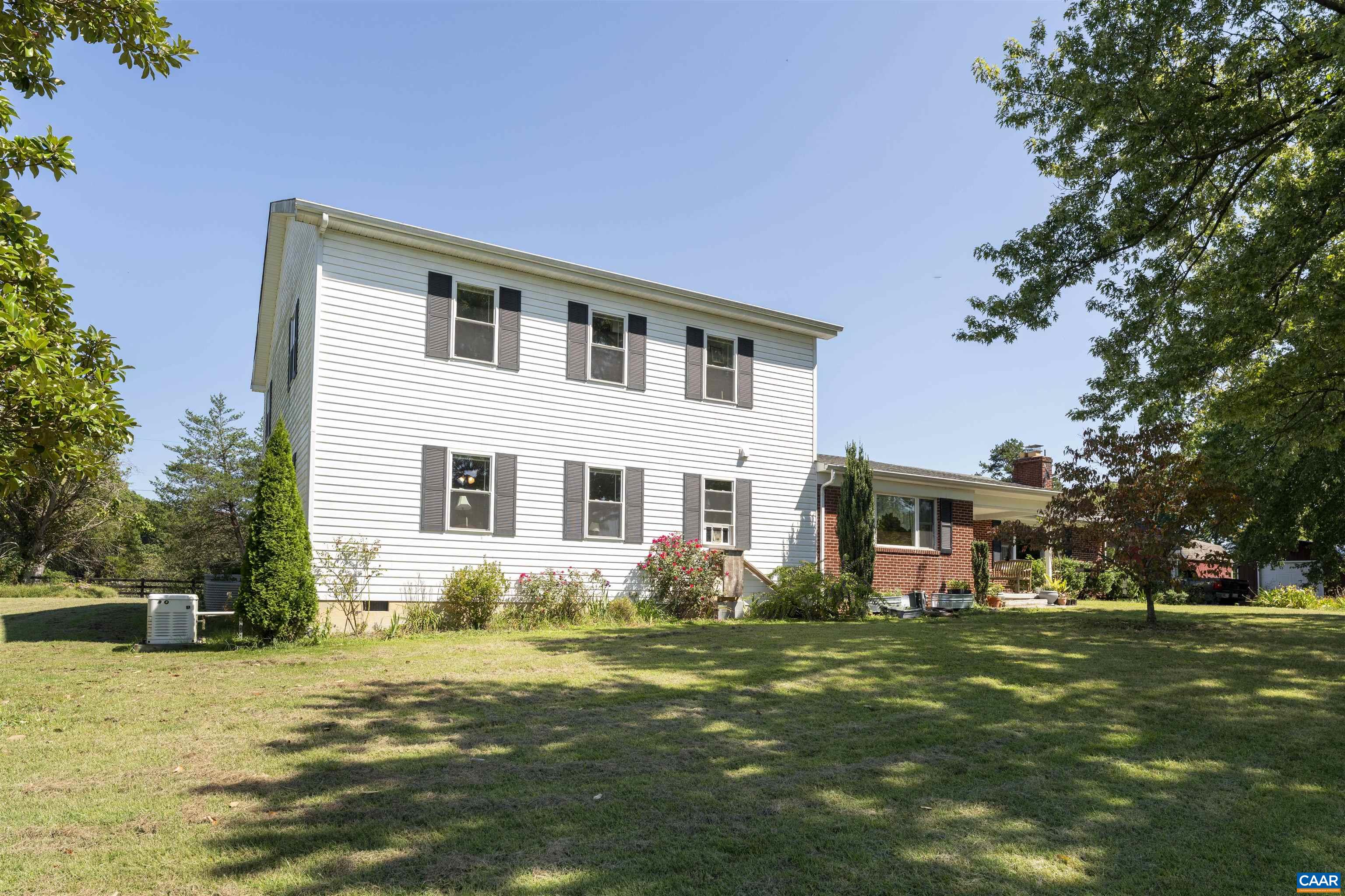 691 Old Roseland Road Roseland, VA 22967 - Photo 41 of 47 a front view of house with yard and trees