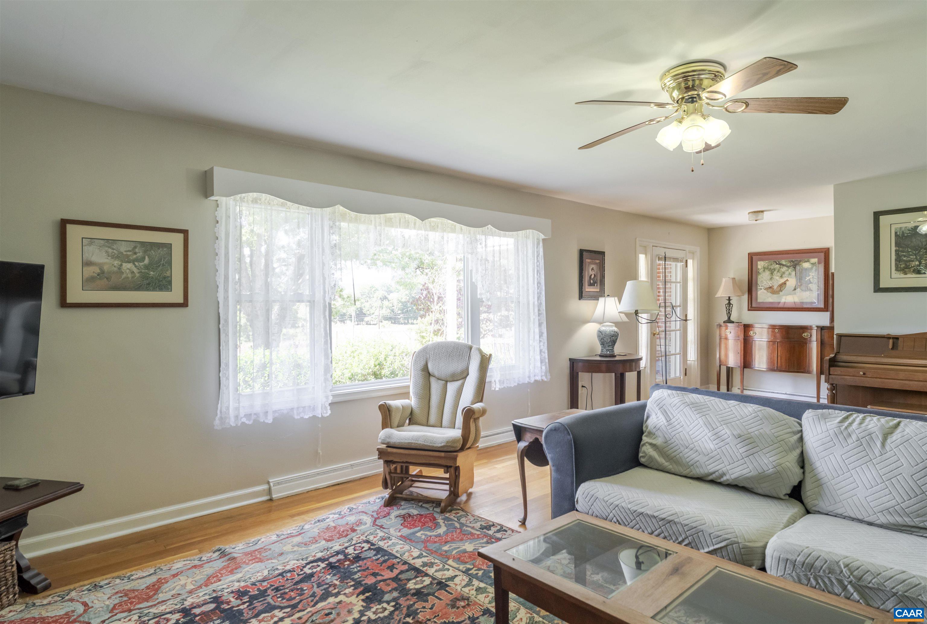 691 Old Roseland Road Roseland, VA 22967 - Photo 7 of 47 a living room with furniture and a window