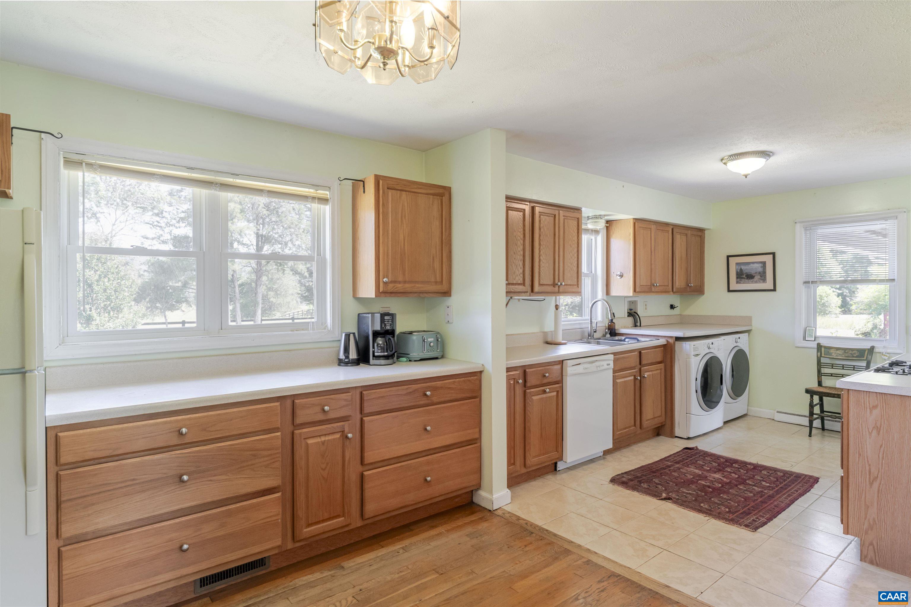 691 Old Roseland Road Roseland, VA 22967 - Photo 9 of 47 a kitchen with a stove a sink and a refrigerator