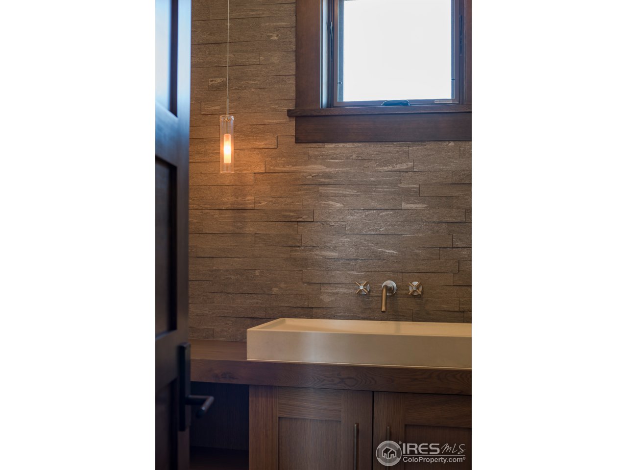 3840 Pleasant Ridge Road Boulder, CO 80301 - Photo 23 of 30 a bathroom with a sink and a mirror