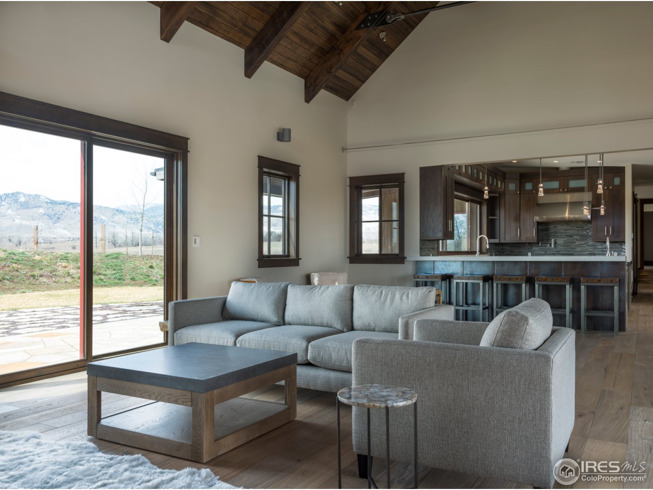 3840 Pleasant Ridge Road Boulder, CO 80301 - Photo 6 of 30 a living room with furniture and a large window