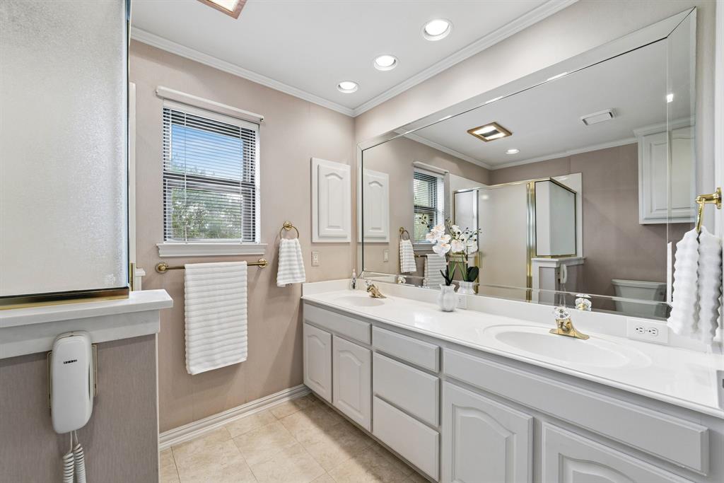 1175 Bloom Street Lucas, TX 75002 - Photo 20 of 36 a spacious bathroom with a double vanity sink a mirror and a bathtub