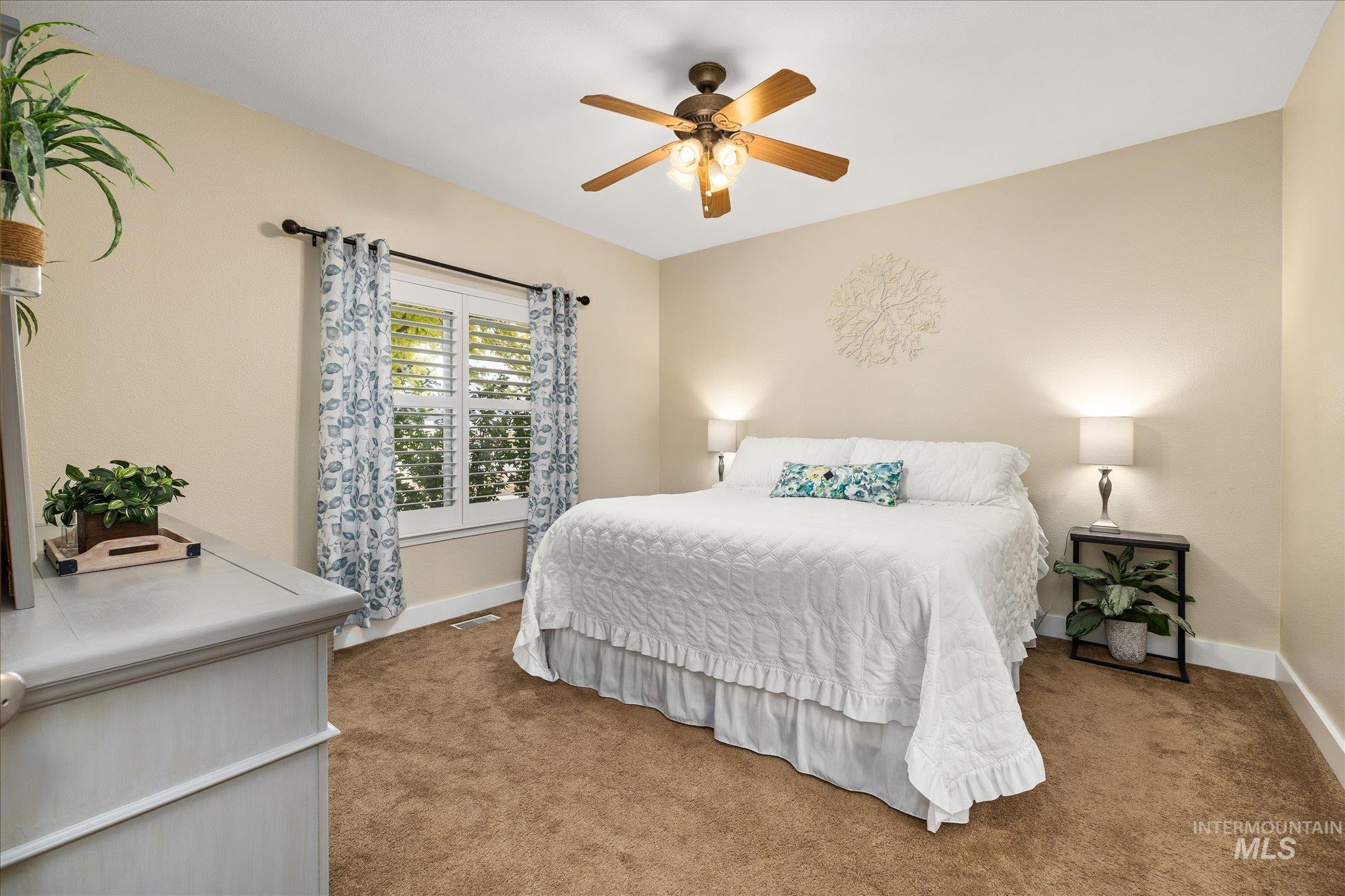 1140 Edgemont Road Emmett, ID 83617 - Photo 15 of 50 Carpeted room with a ceiling fan light fixture