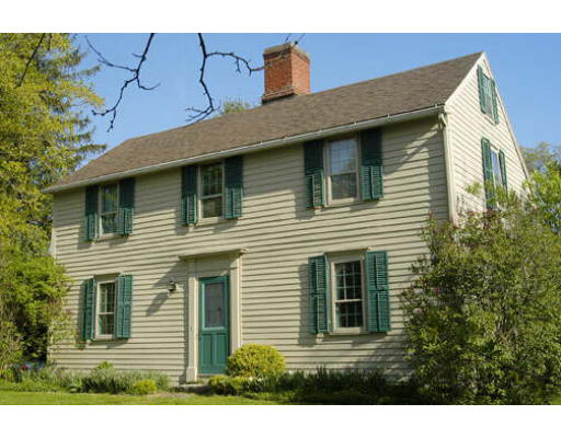 123 Audubon Road Northampton, MA 01053 - Photo 6 of 25 a view of a house with many windows and potted plants