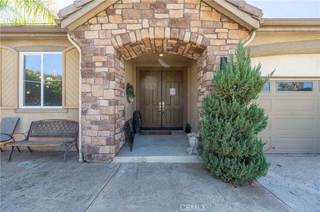 a view of front door of house with outdoor space