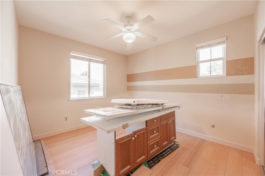 29276 Discovery Ridge Drive Saugus, CA 91390 - Photo 17 of 21 a utility room with a stove a sink and a window