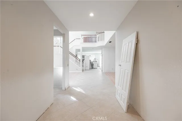 a view of a hallway with a white walls