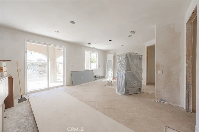 a view of empty room with large window