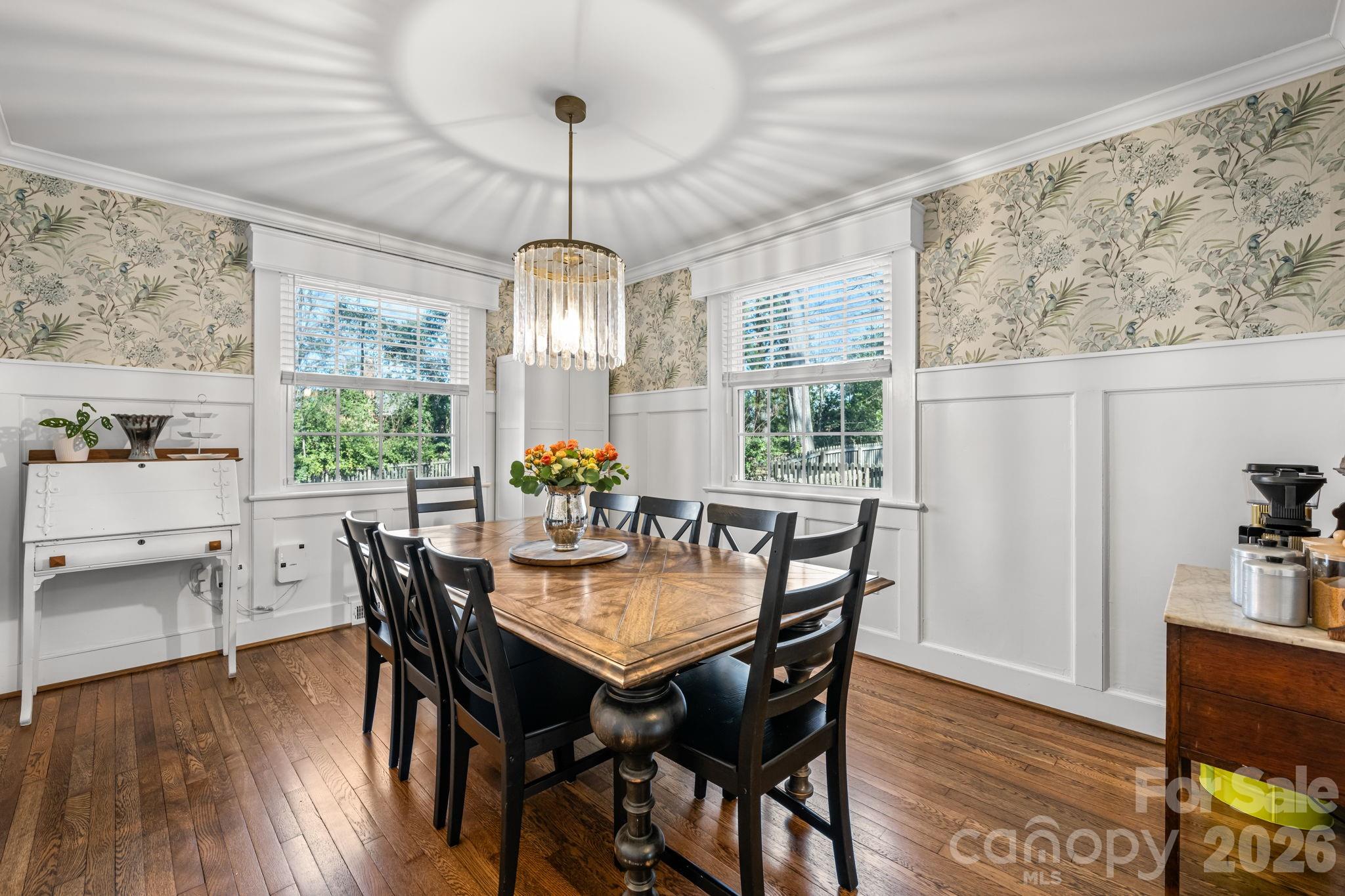 530 7th Street Northwest Hickory, NC 28601 - Photo 8 of 34 a view of a dining room with furniture window and wooden floor