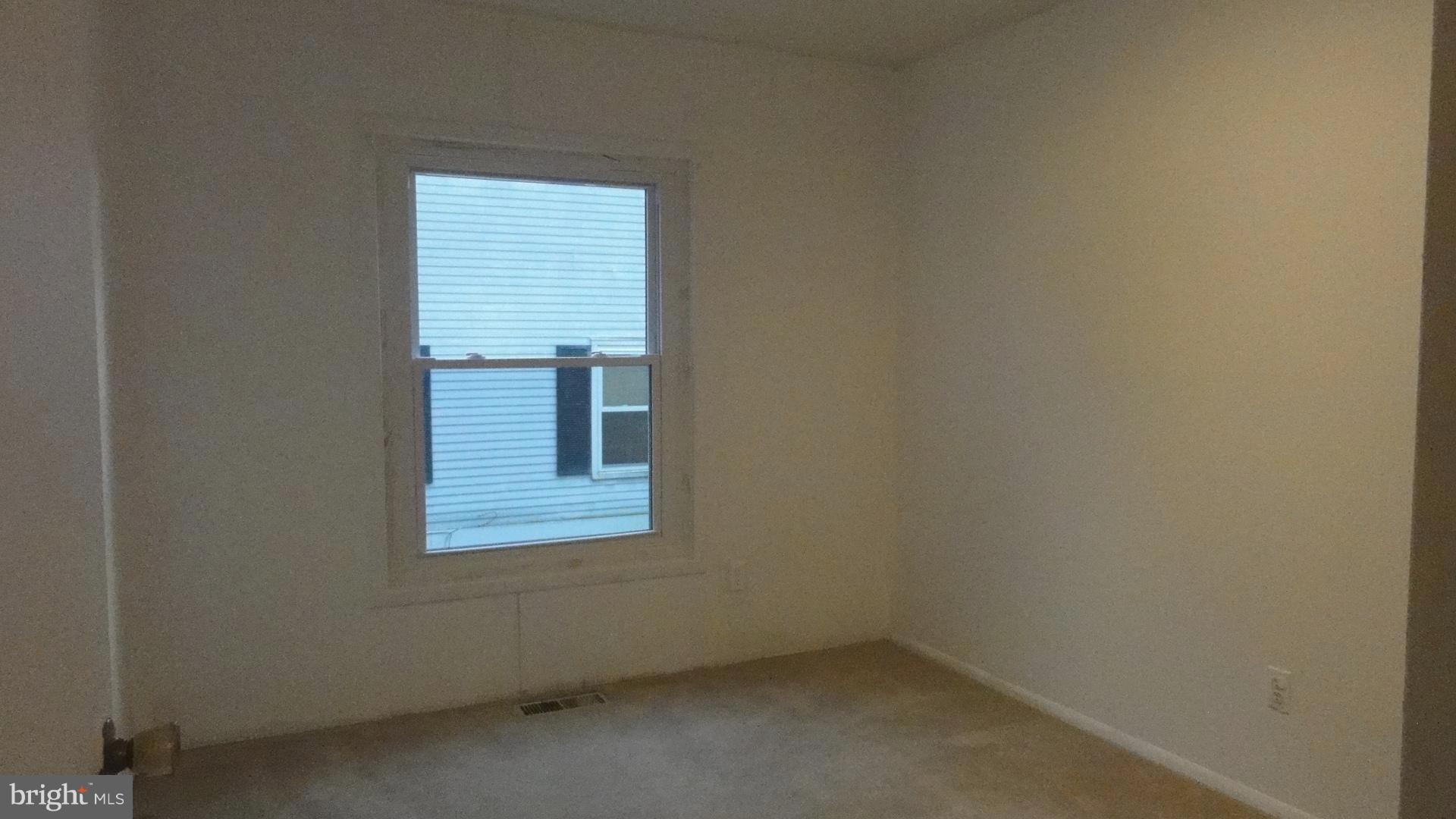 11 Benwell Road, Unit C Reisterstown, MD 21136 - Photo 11 of 16 2nd Bedroom w/Carpet & Single Window