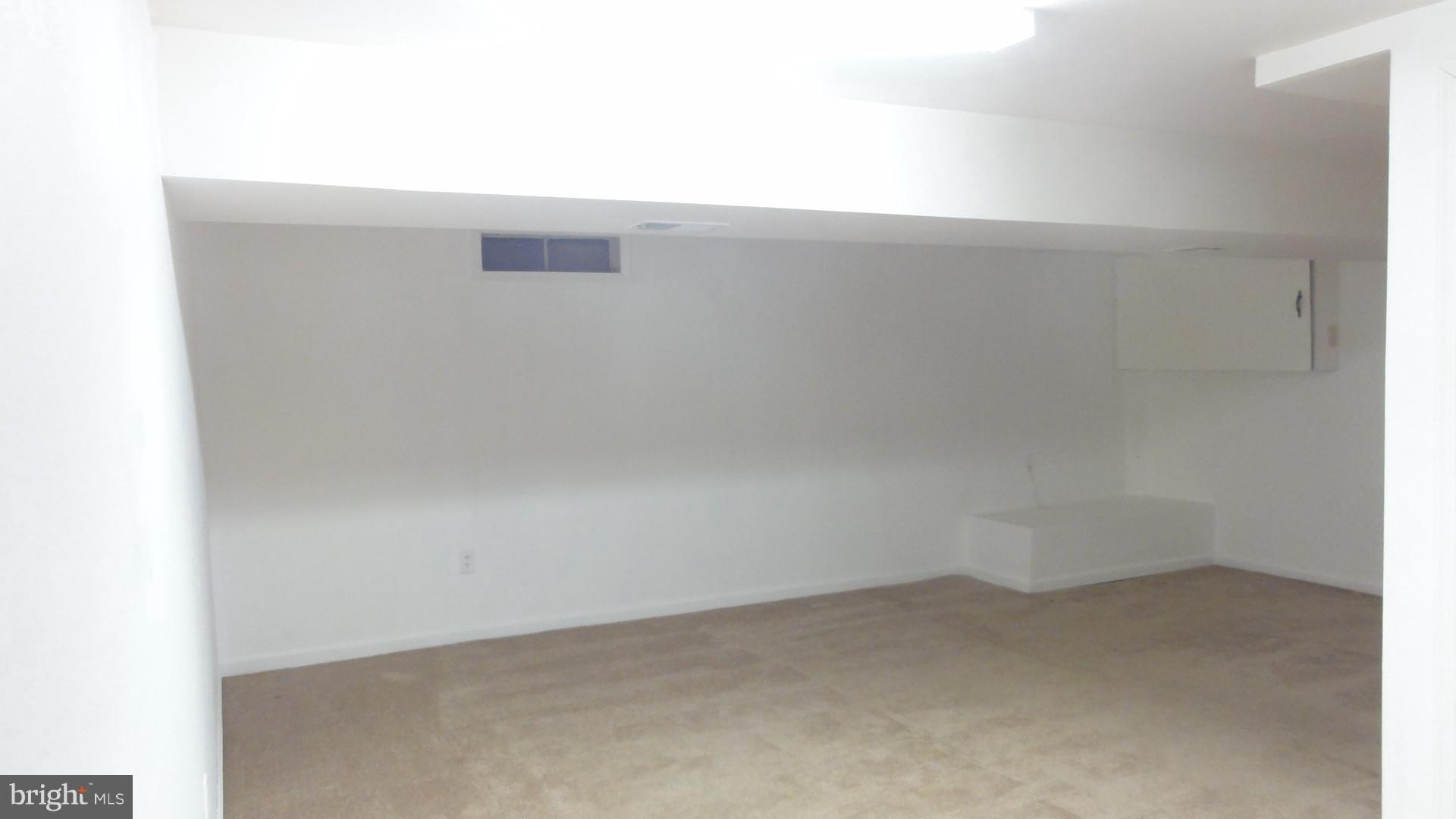 11 Benwell Road, Unit C Reisterstown, MD 21136 - Photo 15 of 16 Large Family Room on Lower Level w/Carpet