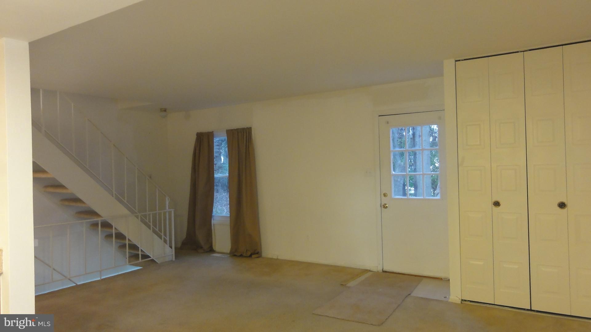 11 Benwell Road, Unit C Reisterstown, MD 21136 - Photo 3 of 16 Living Room w/Carpet & Large Coat Closet