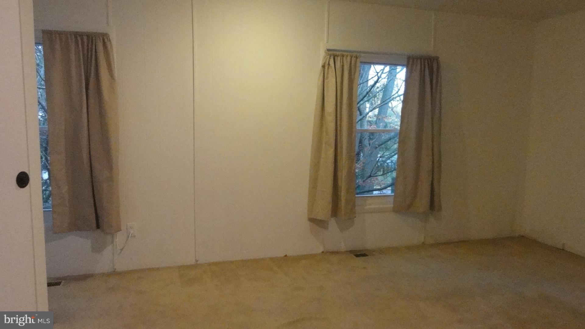 11 Benwell Road, Unit C Reisterstown, MD 21136 - Photo 10 of 16 Master Bedroom w/Carpet & 2 single Windows