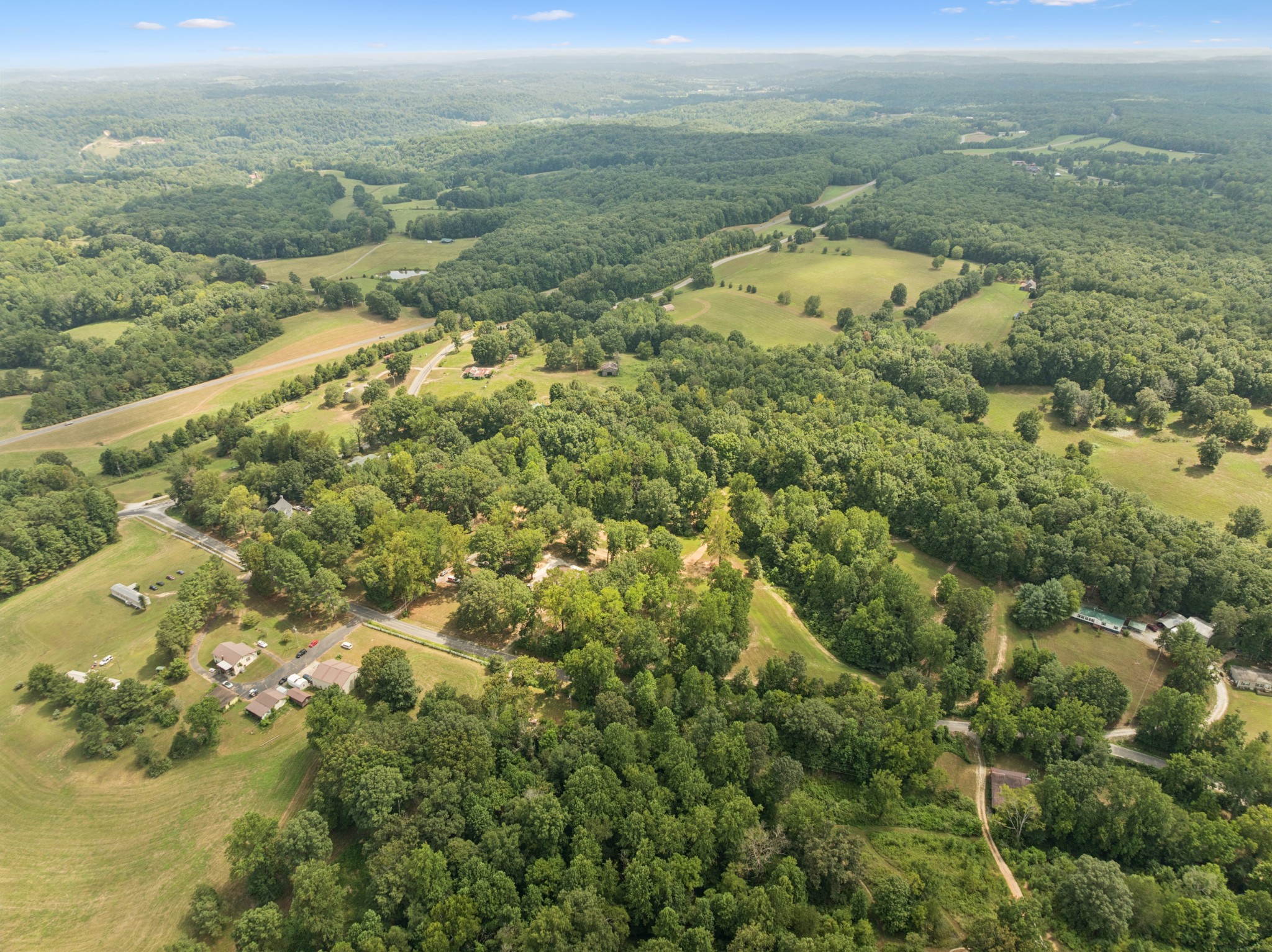 0 Dog Creek Road Primm Springs, TN 38476 - Photo 5 of 30 a view of a lake with a city
