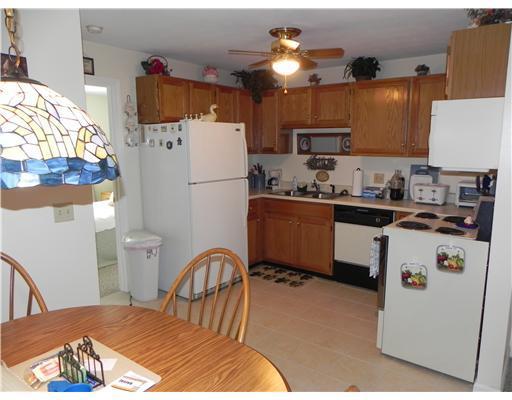 1351 Post Road, Unit 112 Wells, ME 04090 - Photo 3 of 11 Kitchen. FULLY APPLIANCED EAT-IN KITCHEN