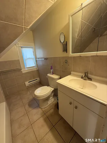 a bathroom with a sink and a toilet