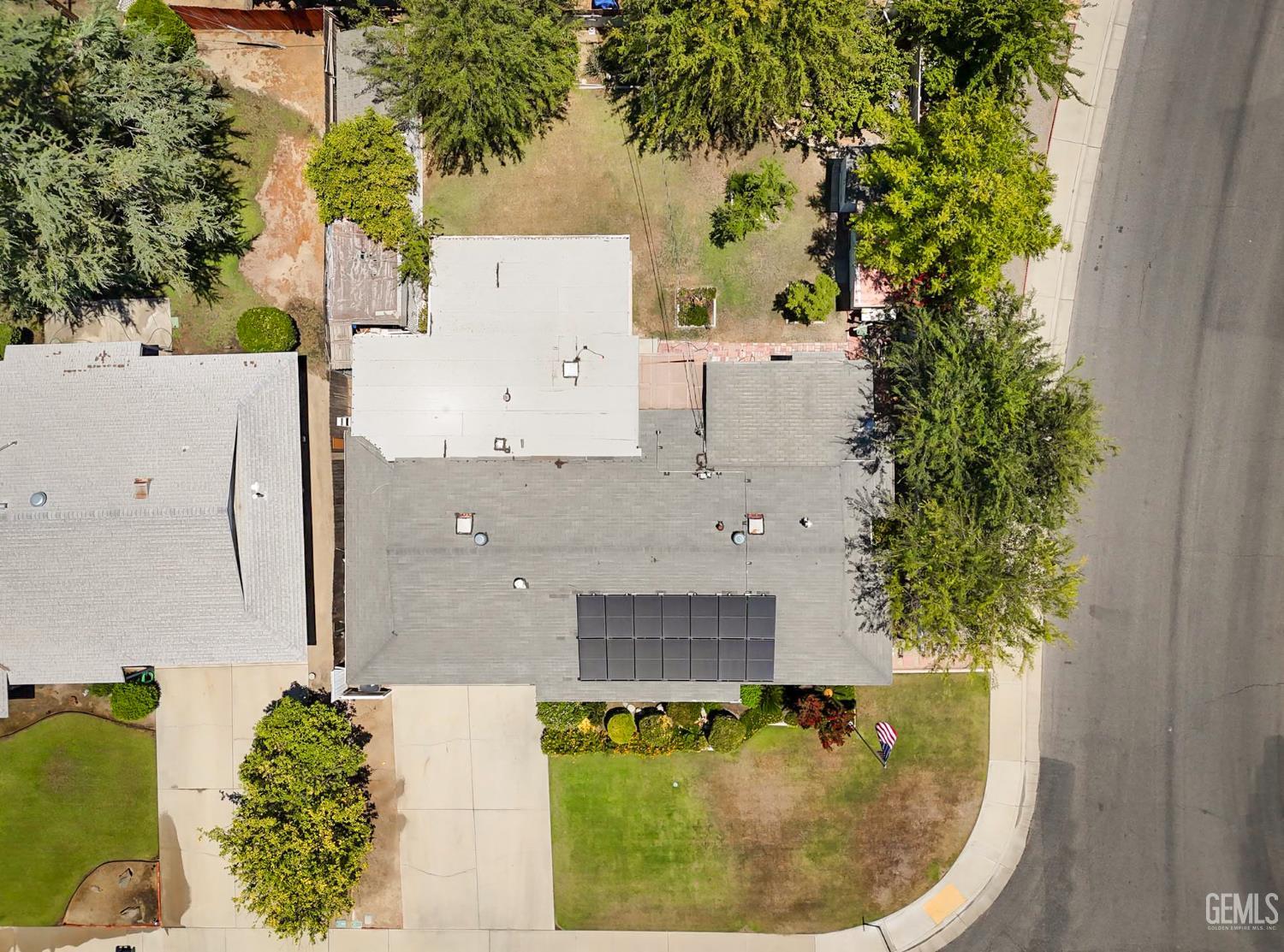 Undisclosed Address Bakersfield, CA 93309 - Photo 5 of 22 an aerial view of a house with outdoor space and a swimming pool