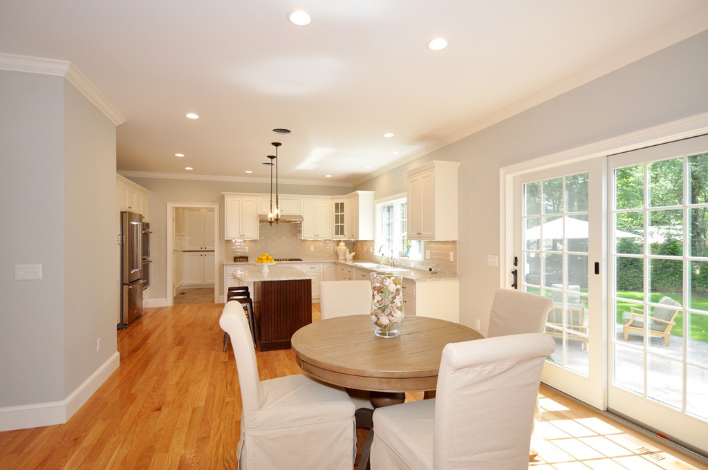 3 Irene Road Bedford, MA 01730 - Photo 15 of 26 a dining room with furniture and a wooden floor