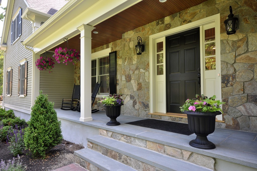 3 Irene Road Bedford, MA 01730 - Photo 2 of 26 a potted plant sitting in front of a house