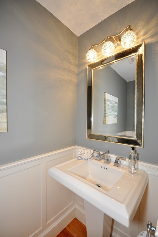 3 Irene Road Bedford, MA 01730 - Photo 23 of 26 a bathroom with a sink and a mirror
