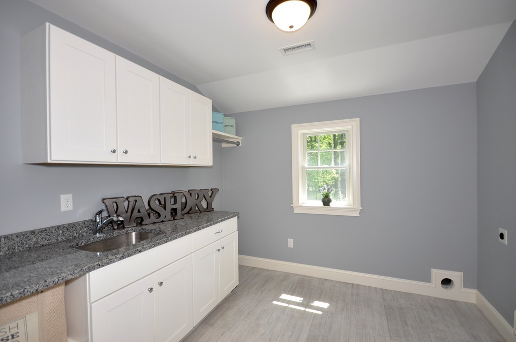 3 Irene Road Bedford, MA 01730 - Photo 26 of 26 a kitchen with a sink cabinets and window