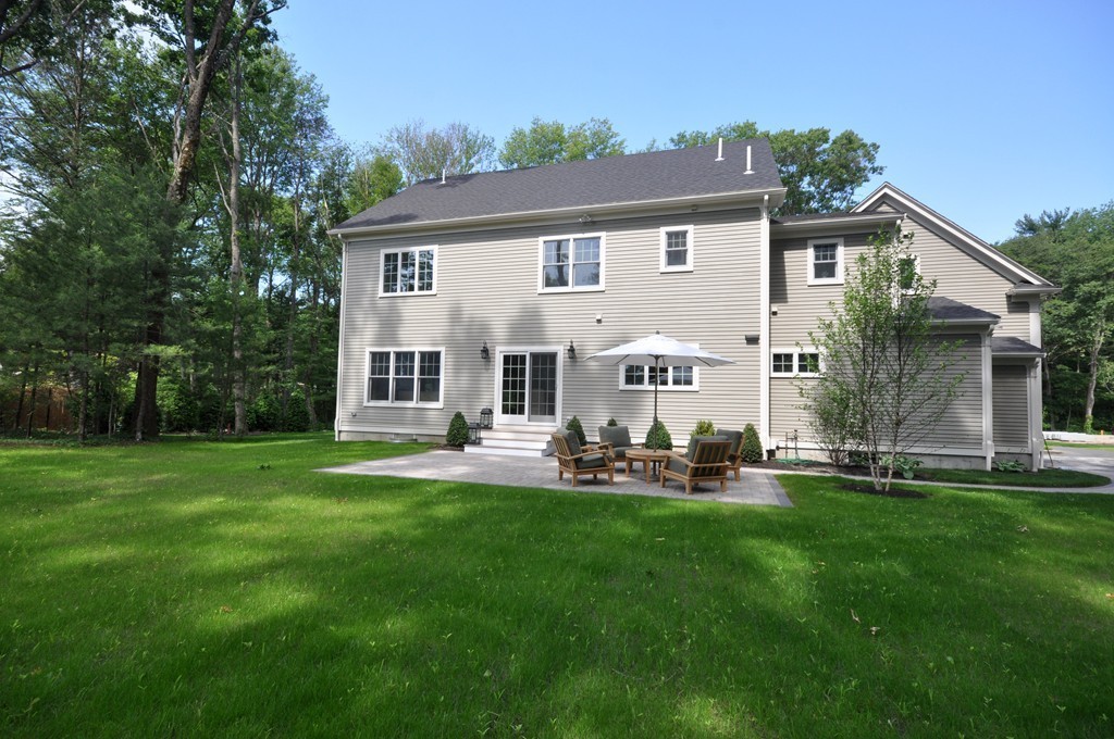 3 Irene Road Bedford, MA 01730 - Photo 5 of 26 front view of a house with a yard