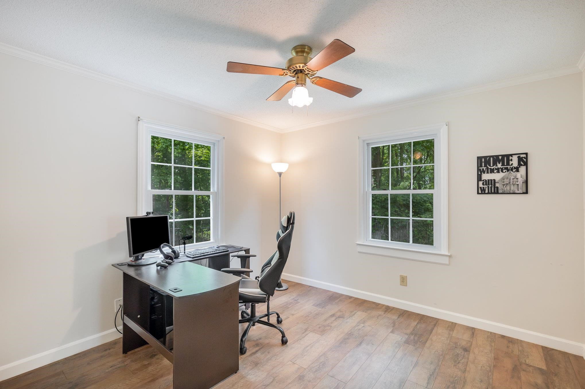 65 White Oak Drive Smithfield, NC 27577 - Photo 11 of 25 a view of a workspace with furniture and a window