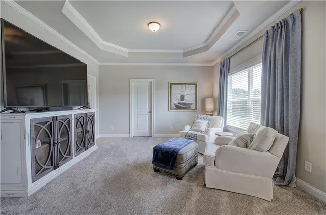 a bathroom with a bathtub sink and mirror