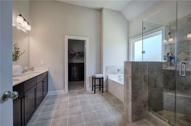 a view of a hallway view with staircase