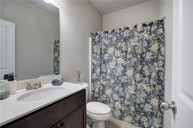 a view of a porch with furniture and garden