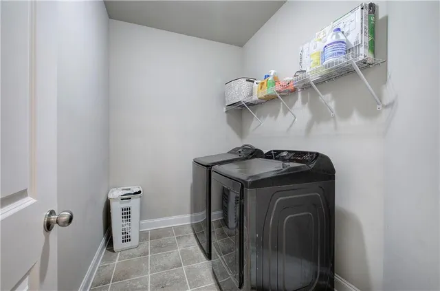 a view of house with backyard