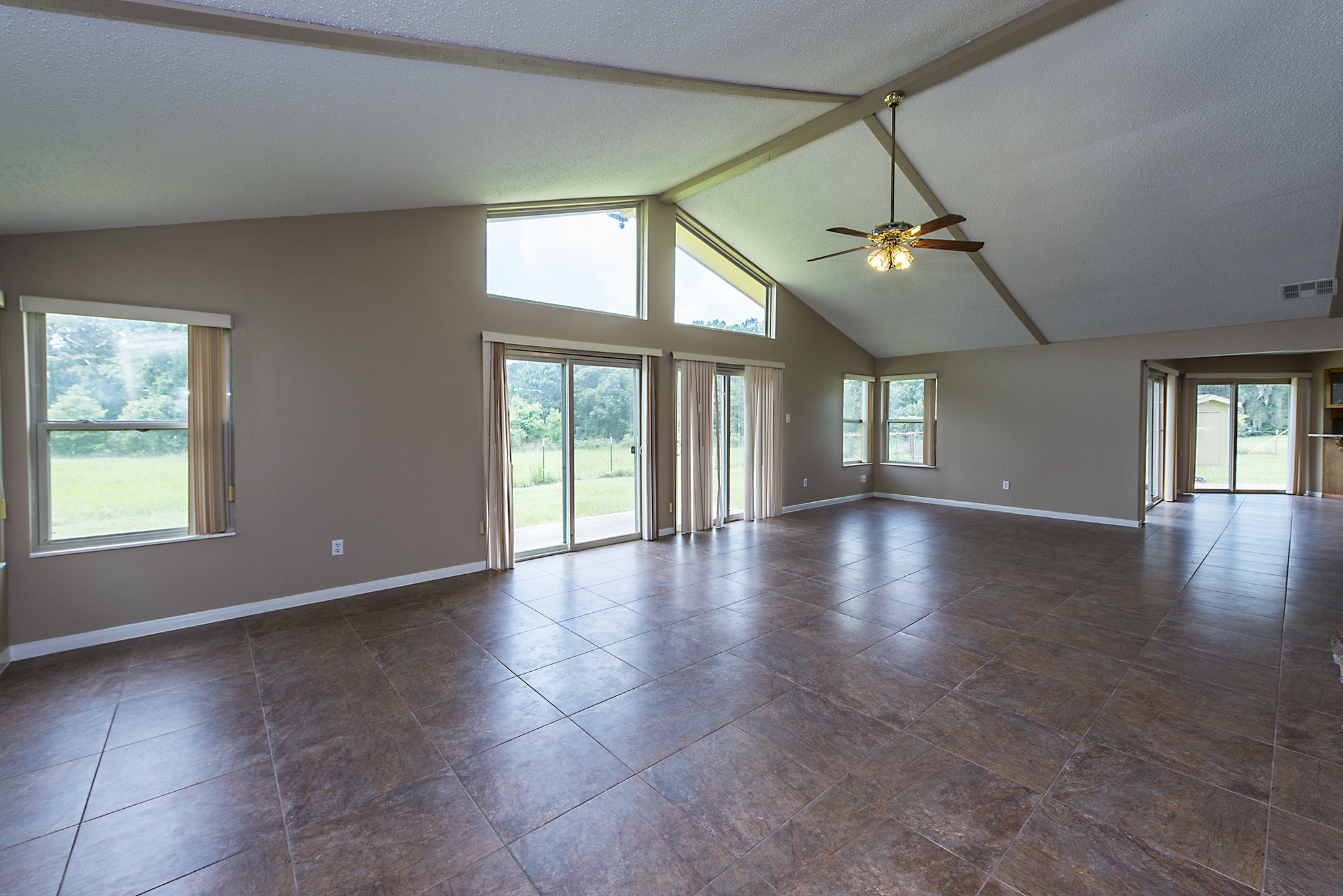 29363 Riley Road Waller, TX 77484 - Photo 5 of 31 Living room leading into dining area.
