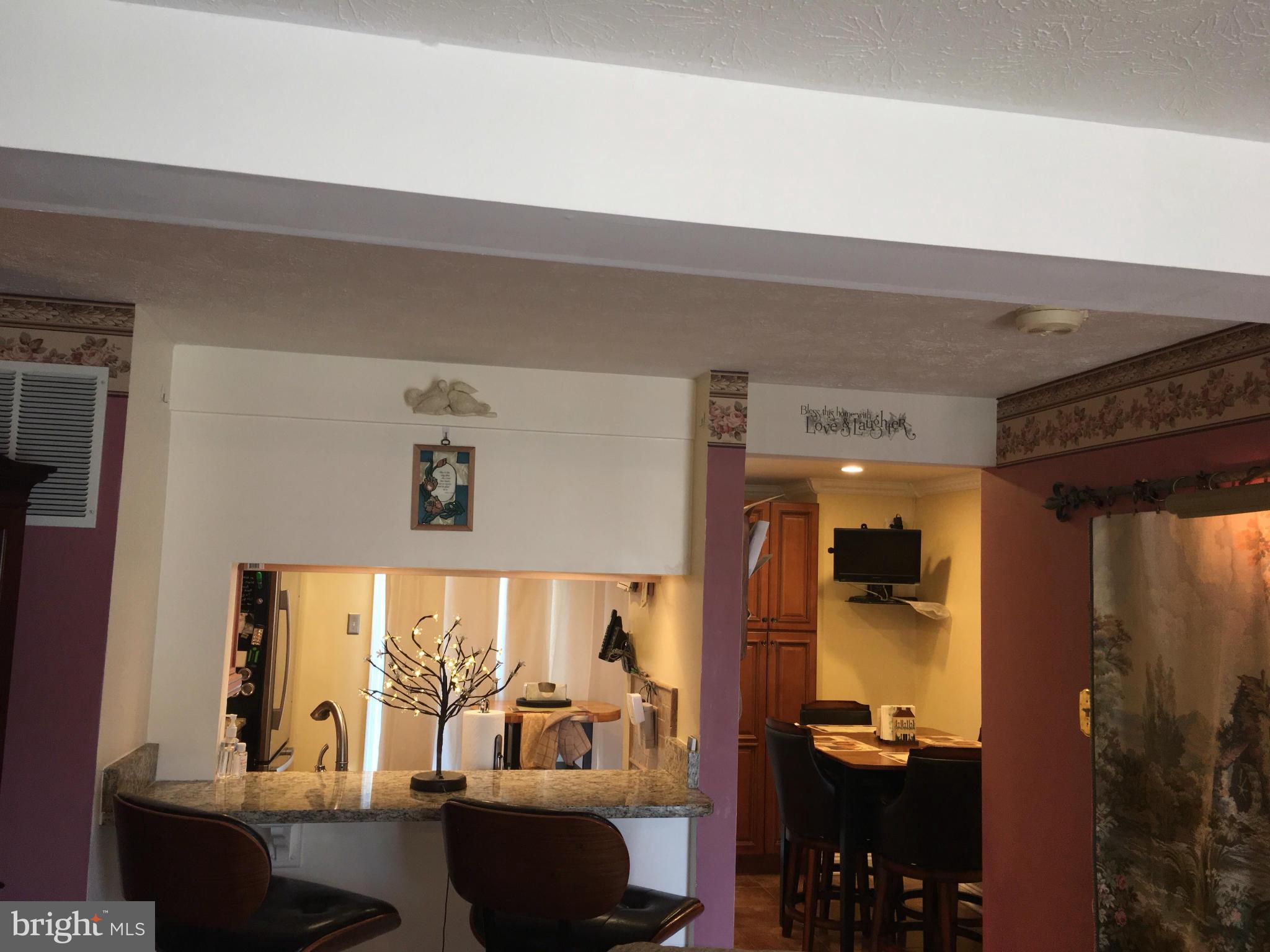 2232 Riding Crop Way Baltimore, MD 21244 - Photo 4 of 12 a view of a living room and dining room