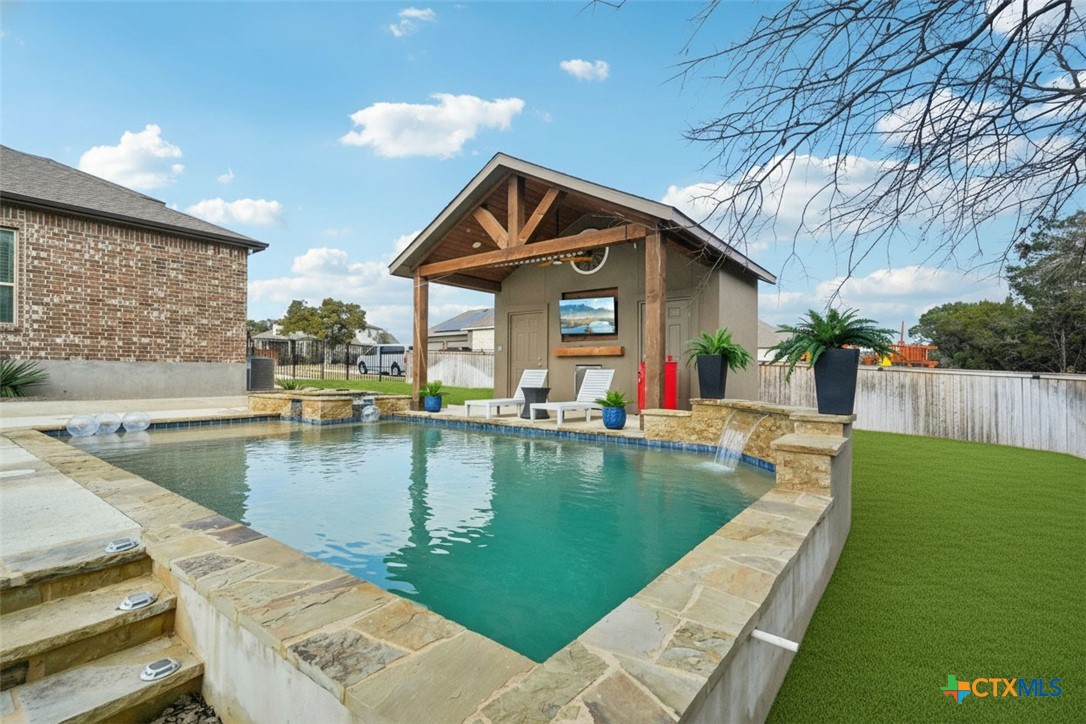 424 Heidelberg Road New Braunfels, TX 78132 - Photo 2 of 41 a view of a house with swimming pool