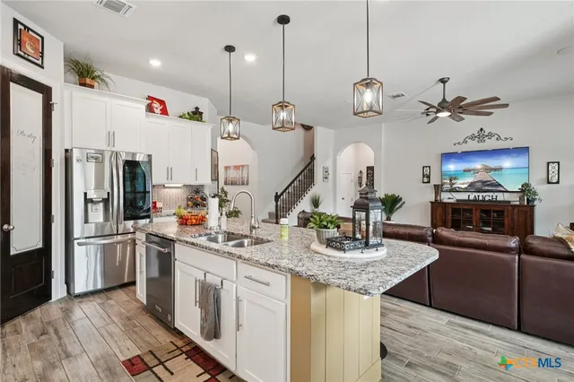 a very nice looking dining room with a table or chairs and wooden floor