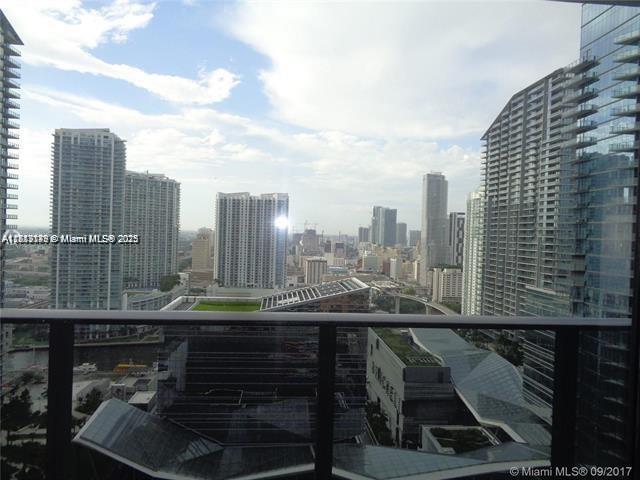 45 Southwest 9th Street, Unit 2709 Miami, FL 33130 - Photo 1 of 34 a view of a city with tall buildings