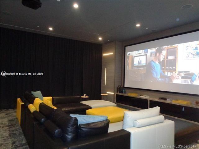 45 Southwest 9th Street, Unit 2709 Miami, FL 33130 - Photo 24 of 34 a projector room with furniture