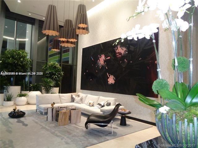 45 Southwest 9th Street, Unit 2709 Miami, FL 33130 - Photo 32 of 34 a building outdoor space with patio furniture