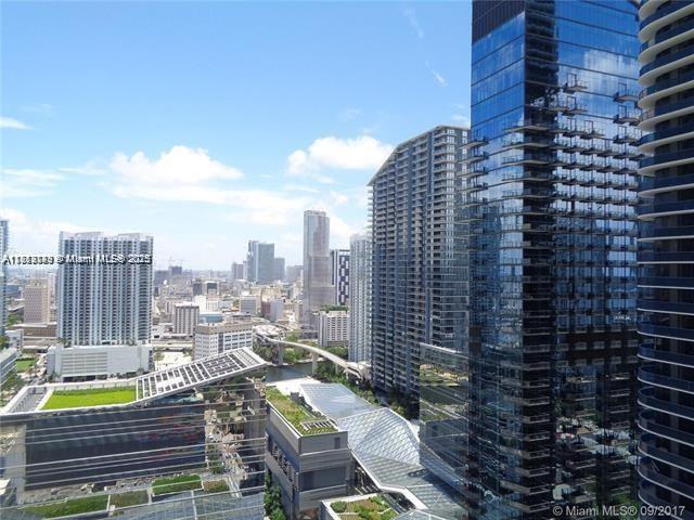45 Southwest 9th Street, Unit 2709 Miami, FL 33130 - Photo 4 of 34 a view of a balcony with city