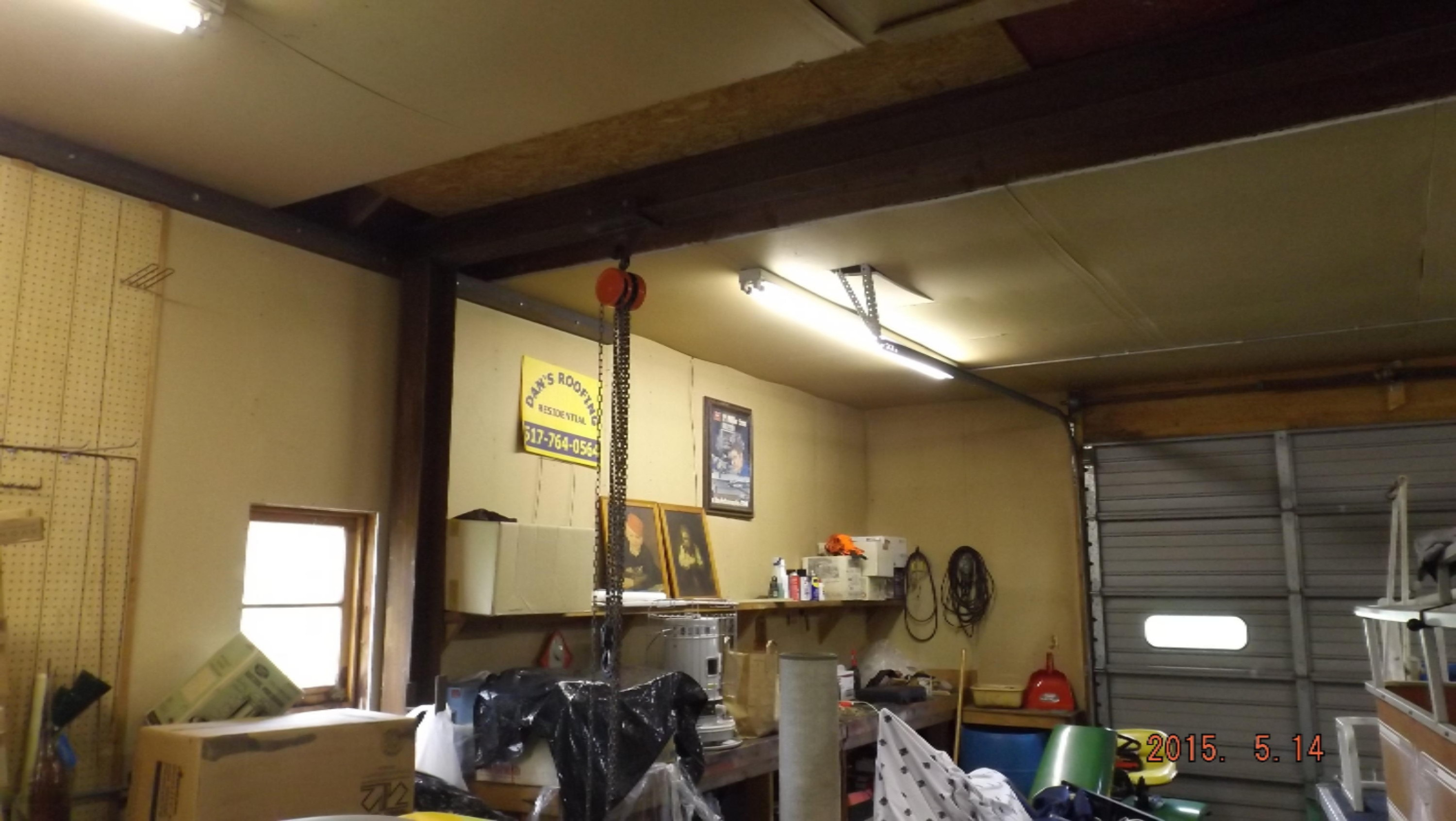 2691 Hemlock Road Quincy, MI 49082 - Photo 25 of 30 Garage with hoist