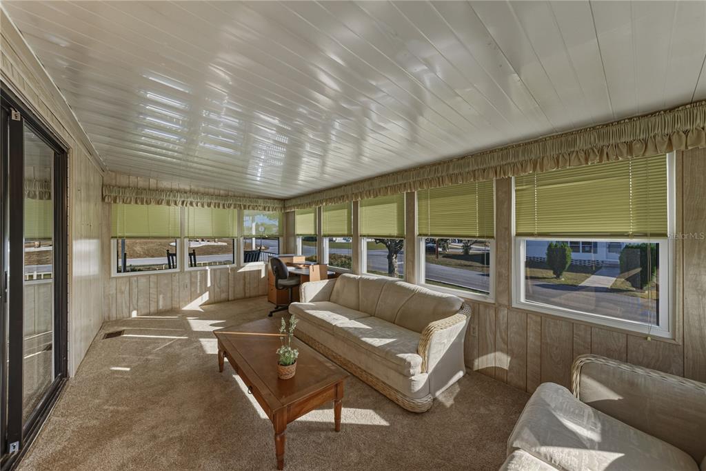 14921 Rialto Avenue Brooksville, FL 34613 - Photo 12 of 55 a living room with furniture