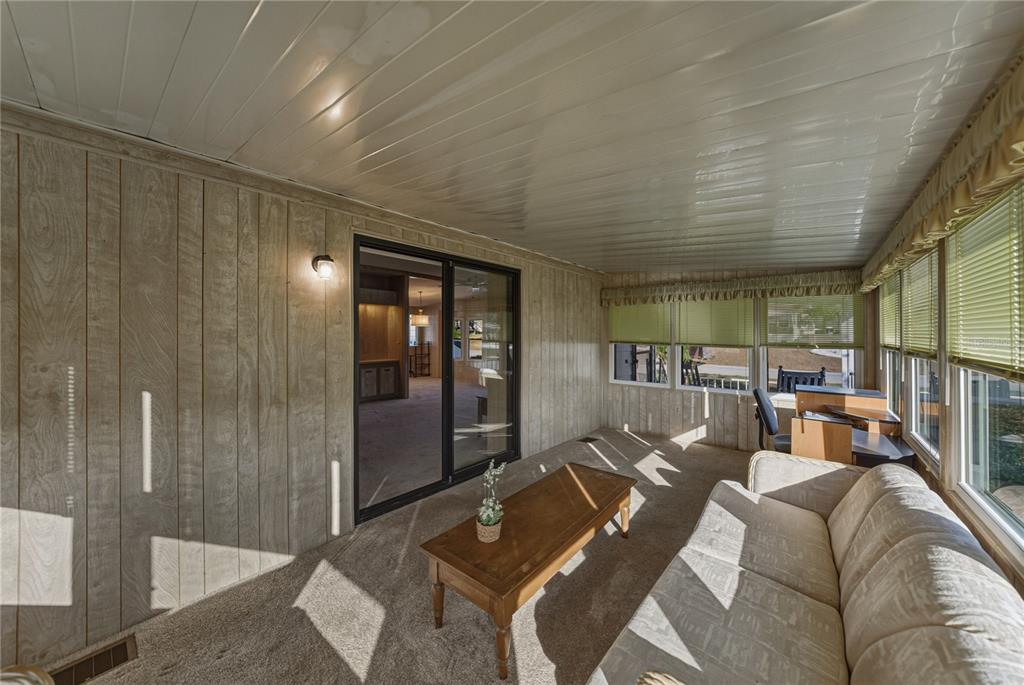 14921 Rialto Avenue Brooksville, FL 34613 - Photo 13 of 55 a living room with furniture