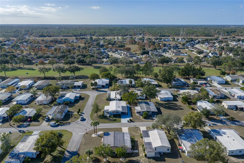 14921 Rialto Avenue Brooksville, FL 34613 - Photo 2 of 55 an aerial view of a city