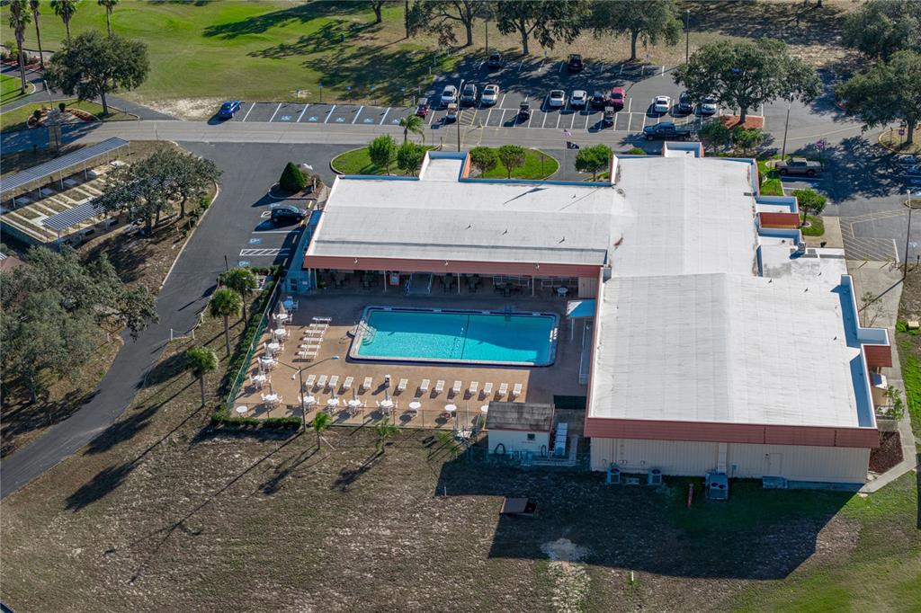 14921 Rialto Avenue Brooksville, FL 34613 - Photo 50 of 55 an aerial view of a house with swimming pool and patio