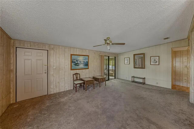 a view of a livingroom with furniture