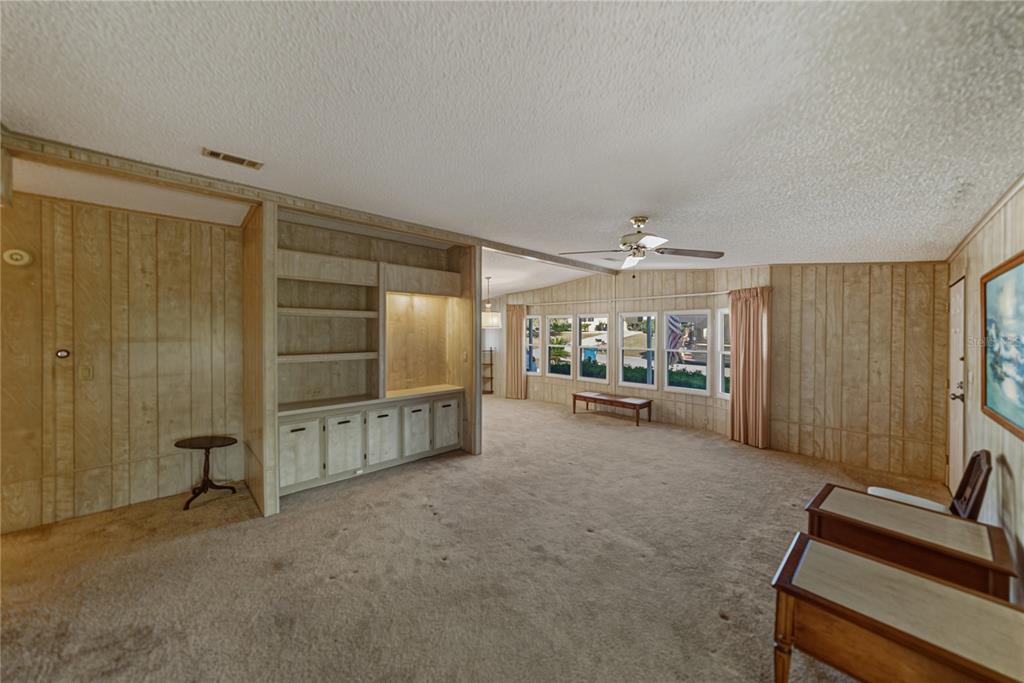 14921 Rialto Avenue Brooksville, FL 34613 - Photo 10 of 55 a view of a livingroom with furniture and staircase