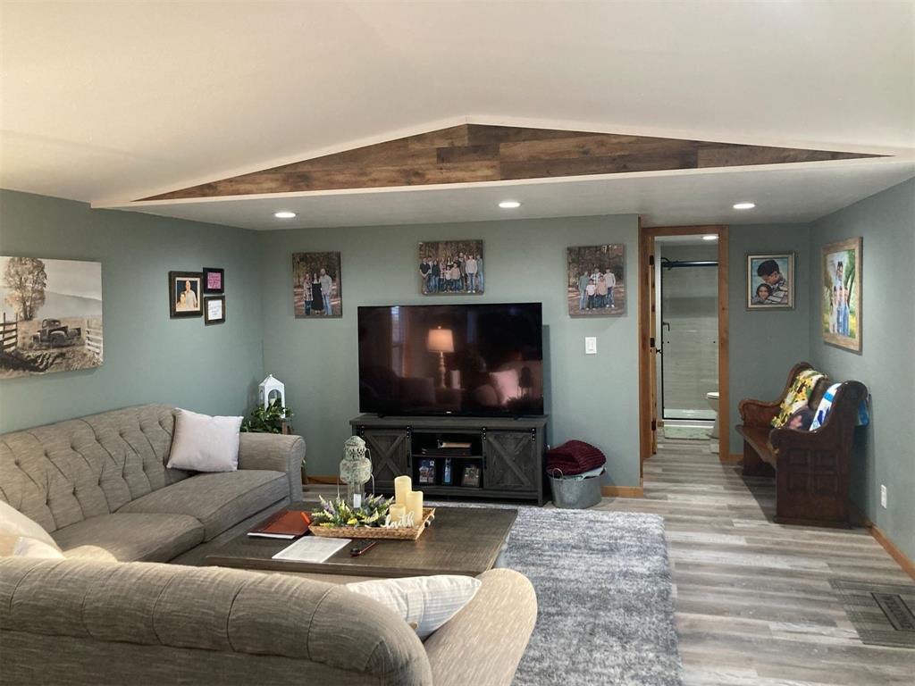248 Shaffer Road Denison, TX 75021 - Photo 6 of 39 a living room with furniture and a flat screen tv